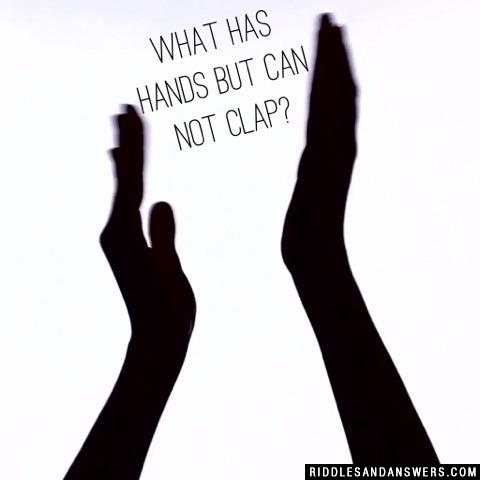 What has hands but can not clap?